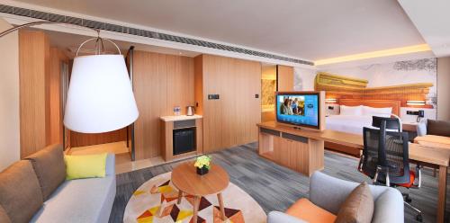 Imagen de la habitación del Hotel Hampton by Hilton Shanghai Hongqiao NECC. Foto 17
