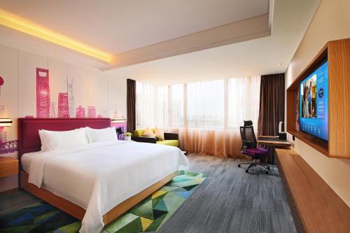 Imagen de la habitación del Hotel Hampton by Hilton Shanghai Hongqiao NECC. Foto 18