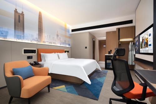 Imagen de la habitación del Hotel Hampton by Hilton Shenzhen Longgang Yonghu. Foto 11