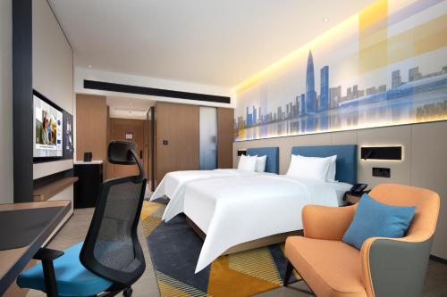 Imagen de la habitación del Hotel Hampton by Hilton Shenzhen Longgang Yonghu. Foto 13