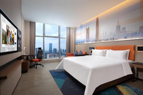 Imagen de la habitación del Hotel Hampton by Hilton Shenzhen Longgang Yonghu. Foto 18