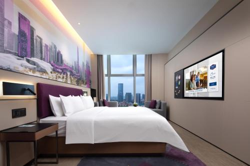 Imagen de la habitación del Hotel Hampton by Hilton Shenzhen Longgang Yonghu. Foto 19