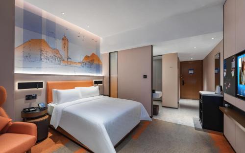 Imagen de la habitación del Hotel Hampton by Hilton Shenzhen Yuanshan. Foto 15