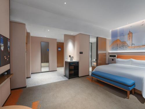 Imagen de la habitación del Hotel Hampton by Hilton Shenzhen Yuanshan. Foto 18