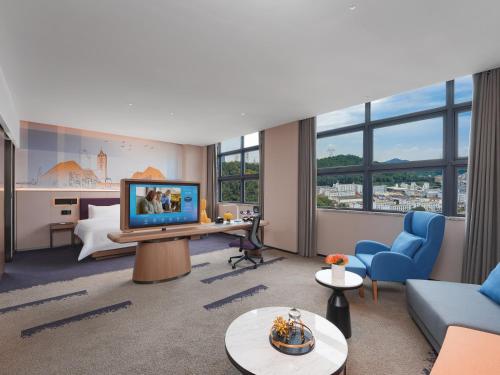 Imagen de la habitación del Hotel Hampton by Hilton Shenzhen Yuanshan. Foto 20