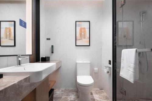 Imagen de la habitación del Hotel Hampton by Hilton Wuhan Zhongnan. Foto 14