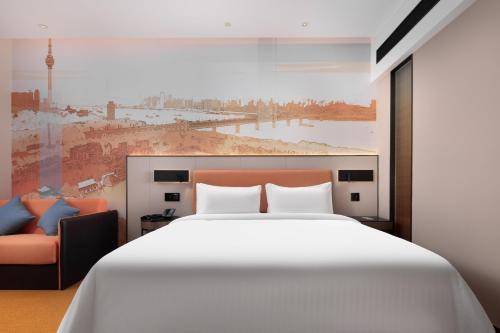 Imagen de la habitación del Hotel Hampton by Hilton Wuhan Zhongnan. Foto 15