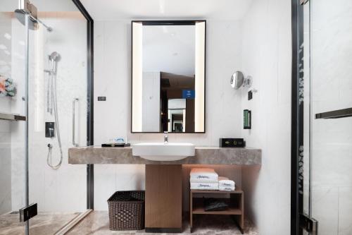 Imagen de la habitación del Hotel Hampton by Hilton Wuhan Zhongnan. Foto 16
