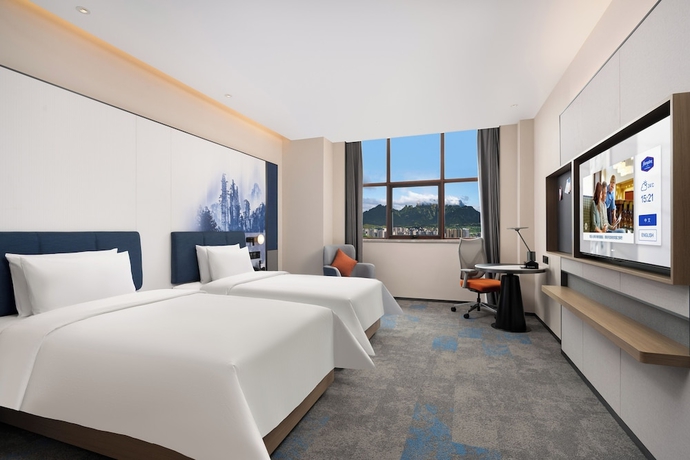 Imagen de la habitación del Hotel Hampton by Hilton Zhangjiajie. Foto 2