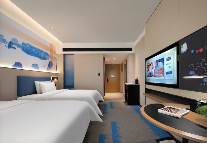 Imagen de la habitación del Hotel Hampton by Hilton Zhangjiajie National Forest Park. Foto 9