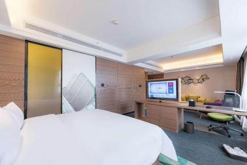 Imagen de la habitación del Hotel Hampton by Hilton Zhengzhou High-Tech Zone. Foto 6