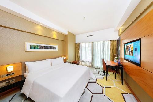 Imagen de la habitación del Hotel Hampton by Hilton Zhuhai Gongbei Port. Foto 13