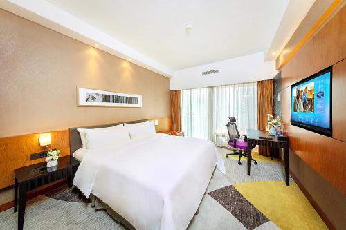 Imagen de la habitación del Hotel Hampton by Hilton Zhuhai Gongbei Port. Foto 15