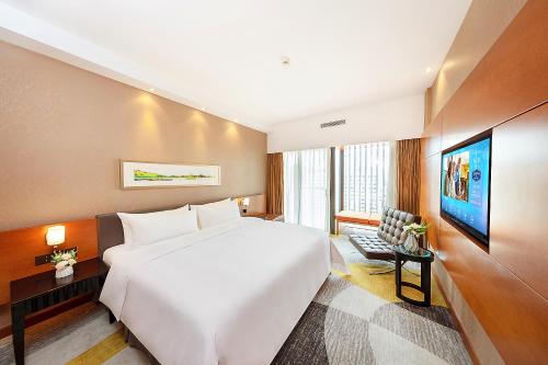 Imagen de la habitación del Hotel Hampton by Hilton Zhuhai Gongbei Port. Foto 18