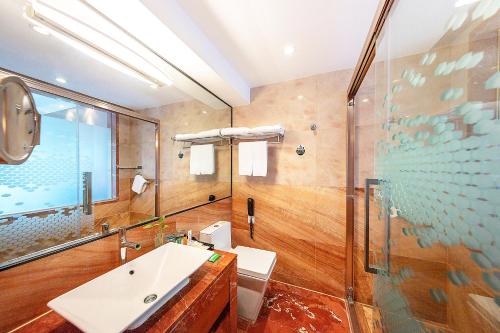 Imagen de la habitación del Hotel Hampton by Hilton Zhuhai Gongbei Port. Foto 19