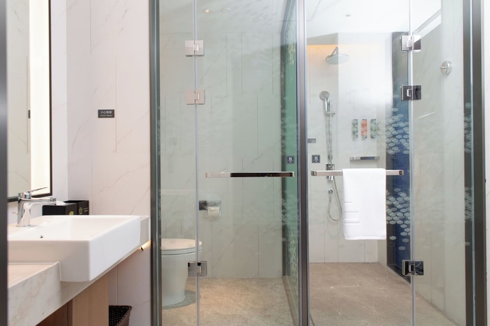 Imagen de la habitación del Hotel Hampton by hilton Jiujiang Bali Lake. Foto 9