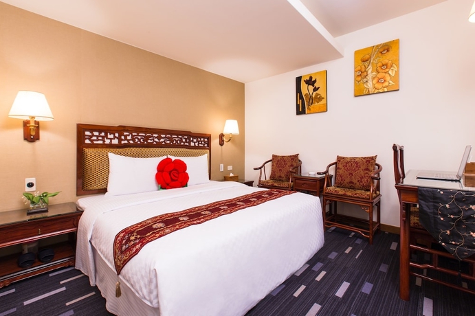 Imagen de la habitación del Hotel Han She. Foto 5