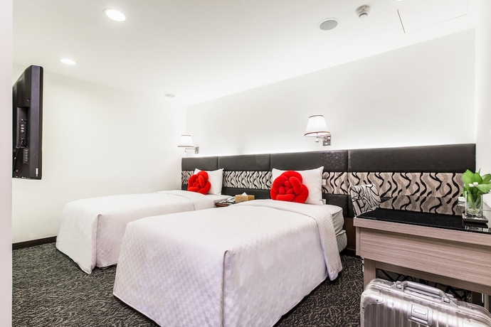 Imagen de la habitación del Hotel Han She. Foto 8