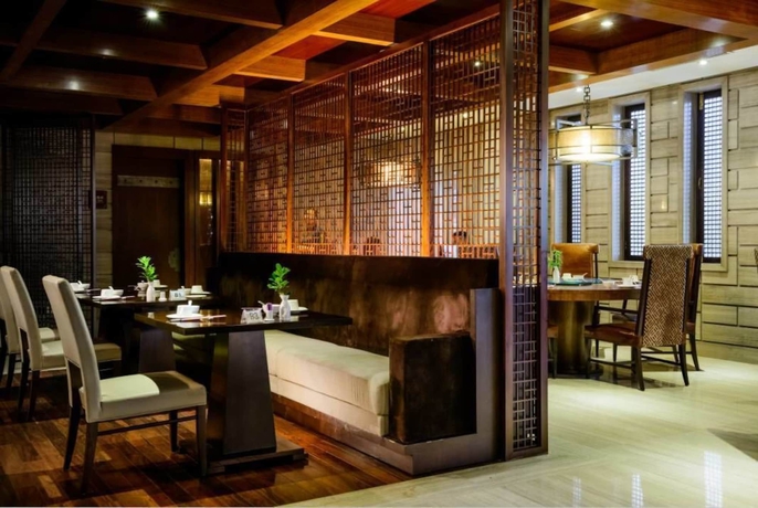 Imagen del bar/restaurante del Hotel Han Yue Lou Resort And Spa, Jiuhuashan. Foto 3