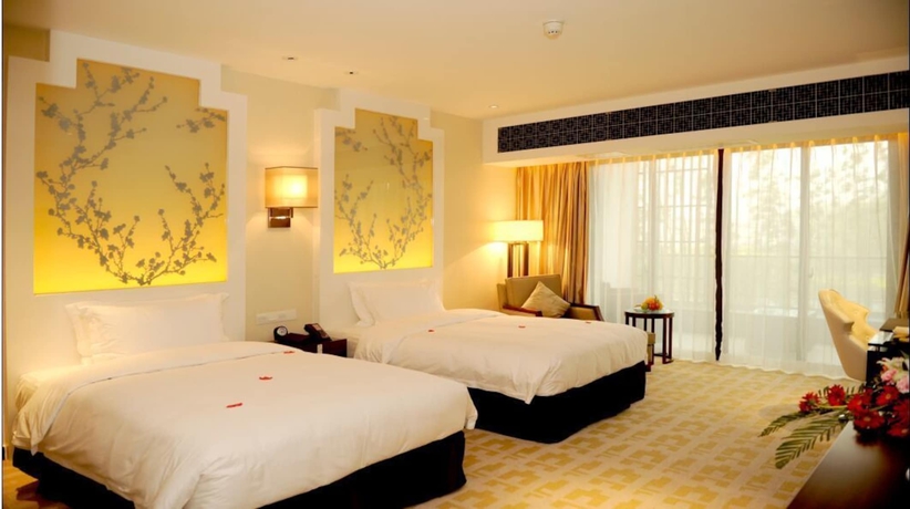 Imagen de la habitación del Hotel Han Yue Lou Resort And Spa, Jiuhuashan. Foto 8