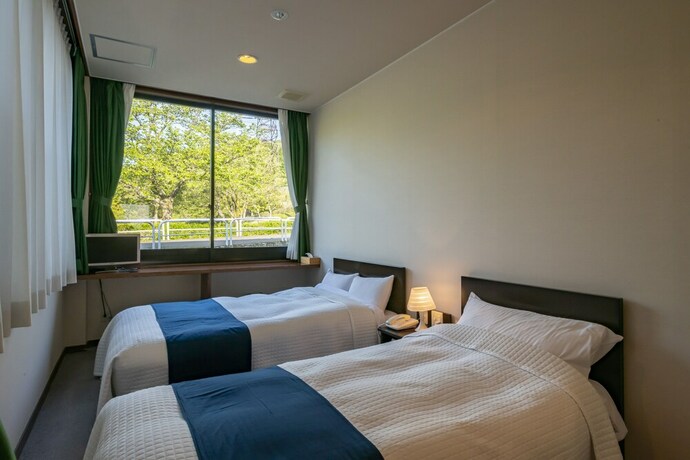 Imagen de la habitación del Hotel Hanahasuonnsenn Somayama. Foto 13