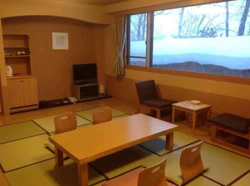 Imagen de la habitación del Hotel Hanakagura. Foto 6