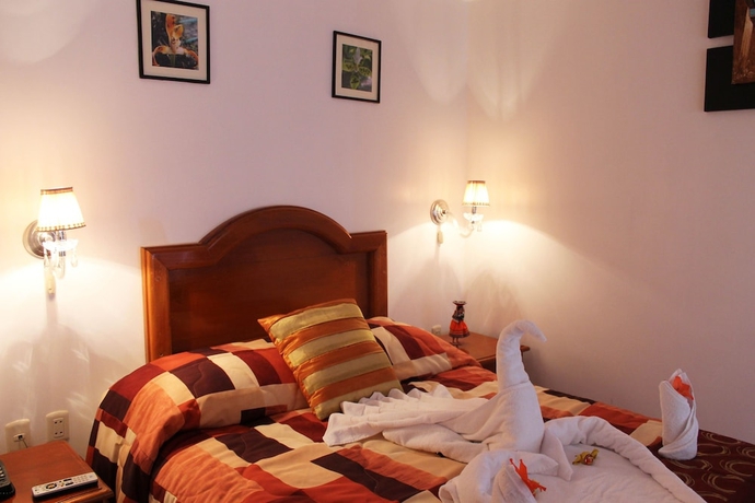 Imagen de la habitación del Hotel Hanaqpacha Inn. Foto 5