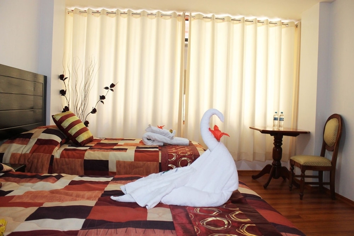Imagen de la habitación del Hotel Hanaqpacha Inn. Foto 9