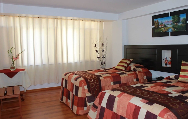 Imagen de la habitación del Hotel Hanaqpacha Inn. Foto 14