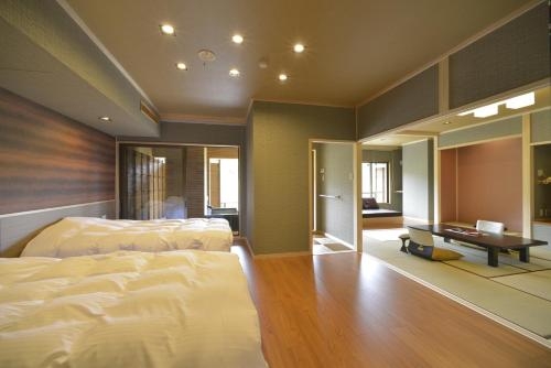 Imagen de la habitación del Hotel Hanashinsui. Foto 8