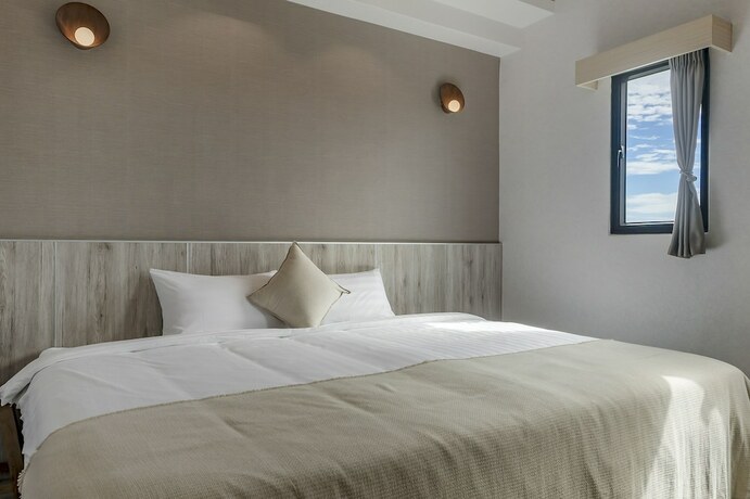 Imagen de la habitación del Hotel Hand Kuma BandB. Foto 19
