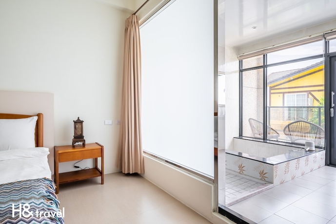 Imagen de la habitación del Hotel Hand Pet Rainbow Maison Resort. Foto 7