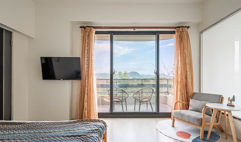 Imagen de la habitación del Hotel Hand Pet Rainbow Maison Resort. Foto 9