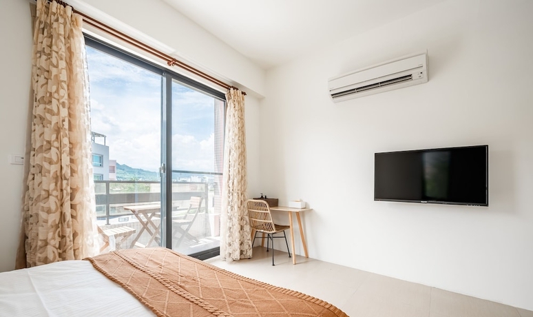 Imagen de la habitación del Hotel Hand Pet Rainbow Maison Resort. Foto 11