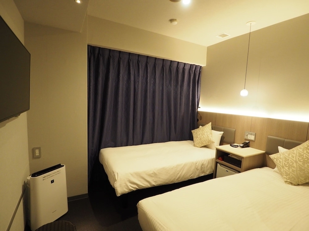 Imagen de la habitación del Hotel Haneda Inn, Ota-Ku. Foto 6
