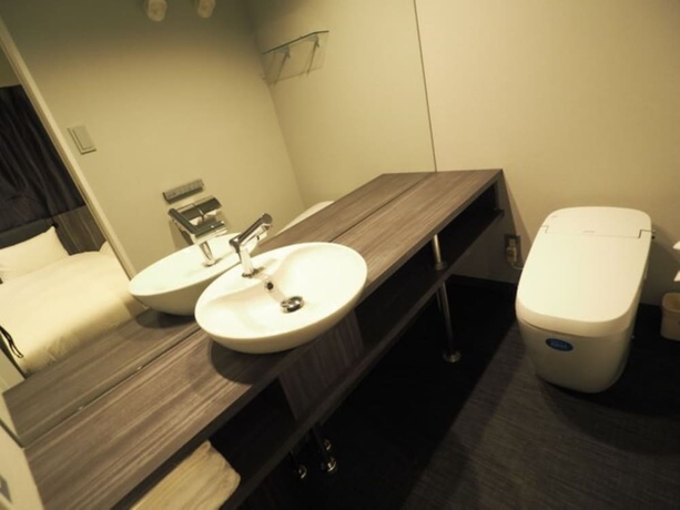 Imagen de la habitación del Hotel Haneda Inn, Ota-Ku. Foto 12