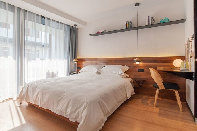 Imagen de la habitación del Hotel Hangzhou Backlighting Inn. Foto 14