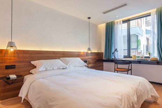 Imagen de la habitación del Hotel Hangzhou Backlighting Inn. Foto 23