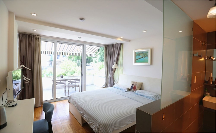 Imagen de la habitación del Hotel Hangzhou Banyan Art House. Foto 8