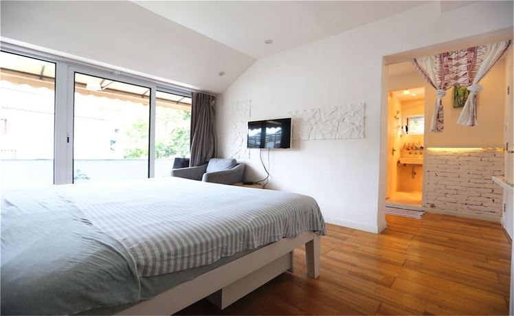 Imagen de la habitación del Hotel Hangzhou Banyan Art House. Foto 15