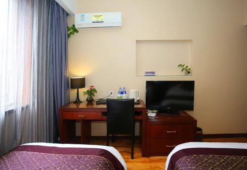 Imagen de la habitación del Hotel Hangzhou Bokai Westlake. Foto 4