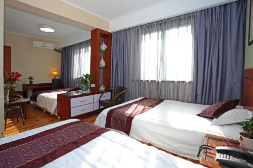 Imagen de la habitación del Hotel Hangzhou Bokai Westlake. Foto 6