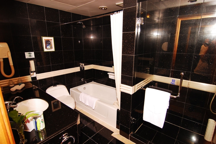 Imagen de la habitación del Hotel Hangzhou Capital Star. Foto 3