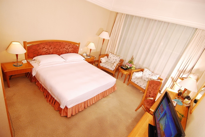 Imagen de la habitación del Hotel Hangzhou Capital Star. Foto 9