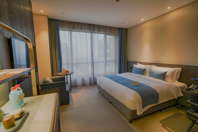 Imagen de la habitación del Hotel Hangzhou Cosy Park Liangzhu. Foto 5