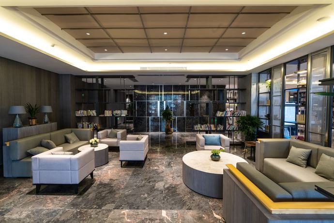 Imagen de los interiores del Hotel Hangzhou Cosy Park Liangzhu. Foto 17