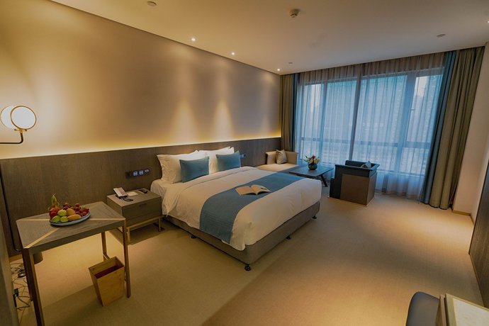 Imagen de la habitación del Hotel Hangzhou Cosy Park Liangzhu. Foto 11