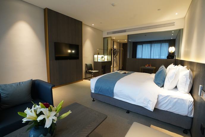 Imagen de la habitación del Hotel Hangzhou Cosy Park Liangzhu. Foto 12