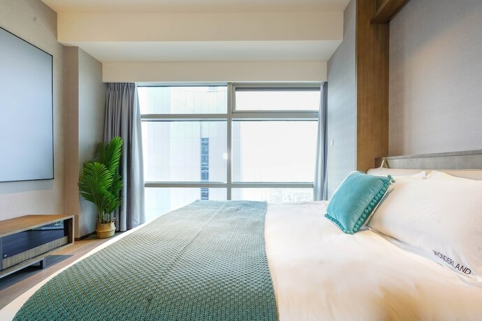 Imagen de la habitación del Hotel Hangzhou Efc Wonderland Apartment - Hangzhou Alibaba T7 Branch. Foto 13