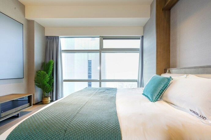 Imagen de la habitación del Hotel Hangzhou Efc Wonderland Apartment - Hangzhou Alibaba T7 Branch. Foto 15